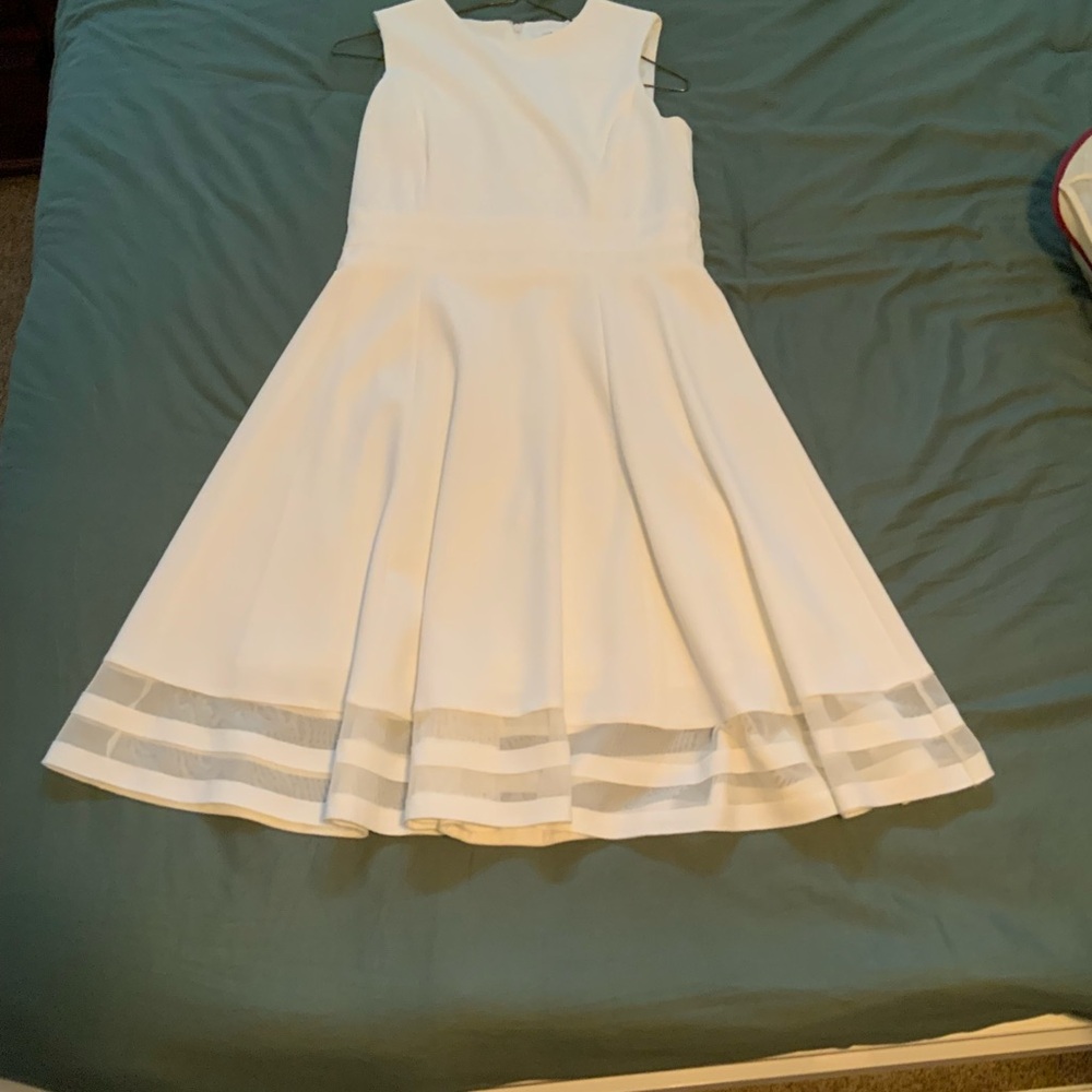 Elegant White Dress with Sheer Hem
